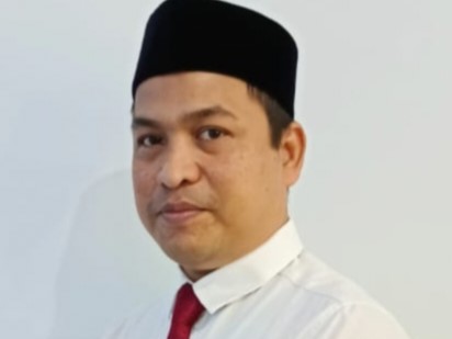 Dr. Rusli, S. Sos, MA
